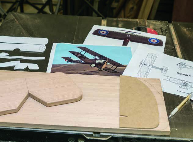 With photographs of the real deal for inspiration the design progressed from diagrams, to paper cut-outs through to work on the upper wing.