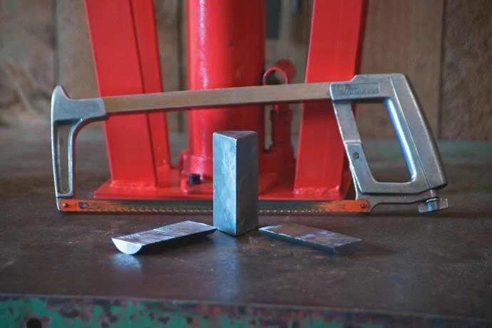 Small bending tool with sides cut with a hacksaw (slowly, and with skill)