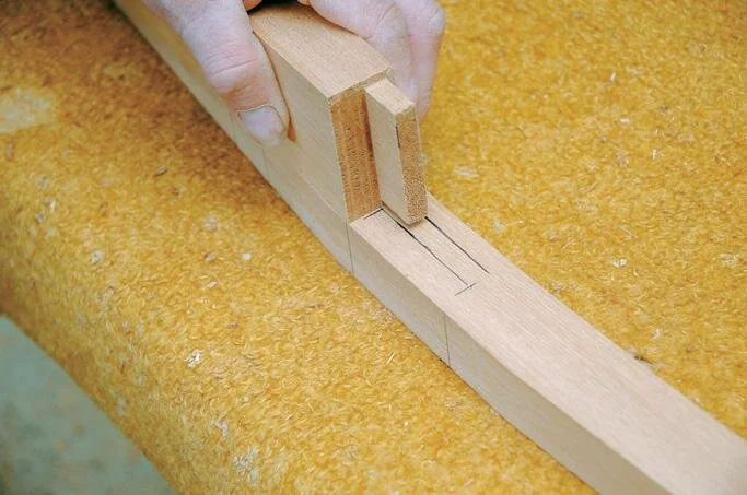 Marking out the back rail mortise in the rear legs