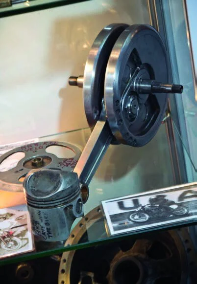 Piston in the Velocette display case of original Mk 8 parts beyond restoration