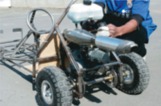 EXHAUST MODIFICATION   You can do the math if you wish.  The exhaust port is open for 150º of crank duration and the exhaust wave velocity is around 1400 ft (426 metres) /sec. The effective length of a tuned exhaust is measured from the piston face around any bends to the reﬂective point of the rear cone.  The reﬂective point is close enough to half the cone’s length. Double this length, as the exhaust pressure wave has to bounce back, travelling back and entering the closing port just before closing.