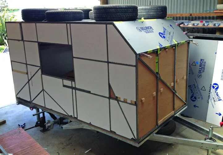 All stages…insulation, inner panel and outer aluminium cladding