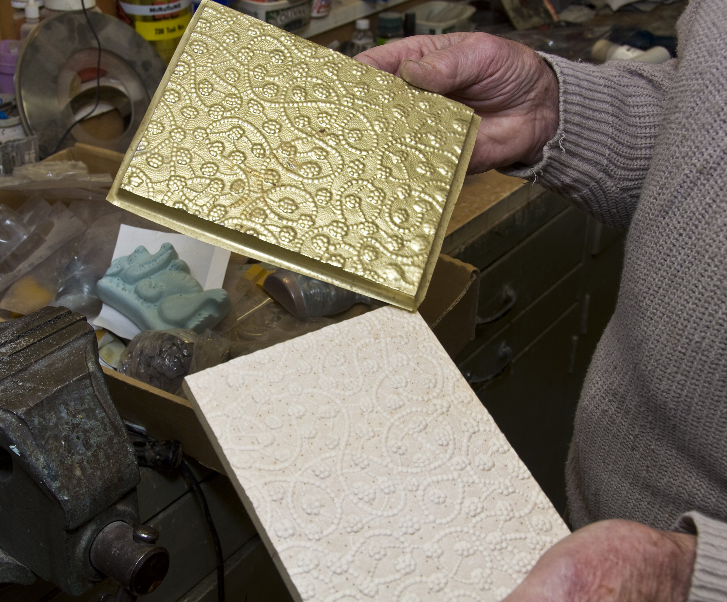 Fancy chocolate container was vacuum-formed from a pattern of wallpaper pasted on bog