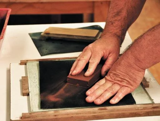 Flattening with wet and dry paper on plate glass