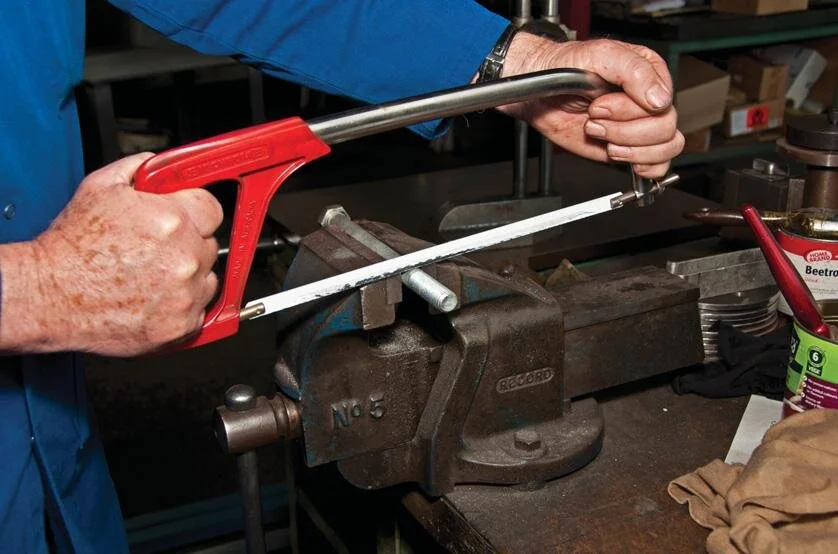 Cutting threaded part off long bolt before re-threading