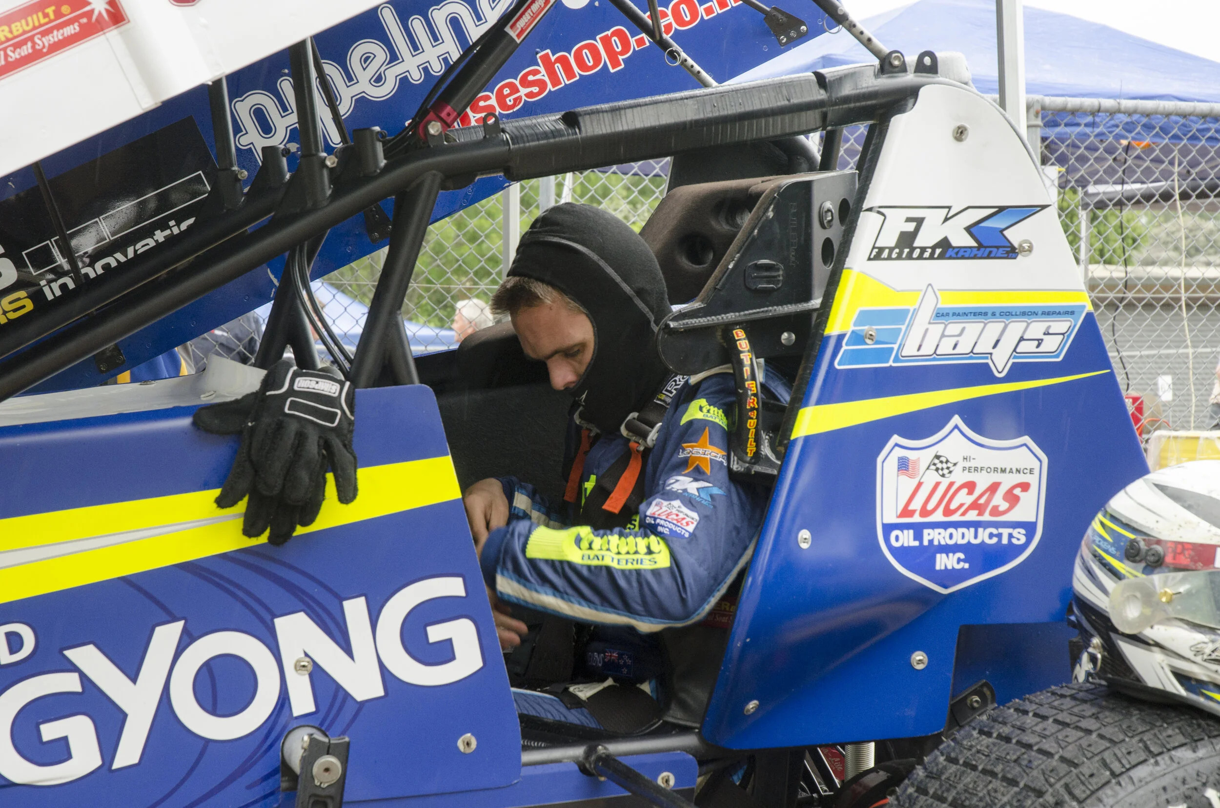Michael Pickens, Midget champion for 2014, kits up in his sprint car