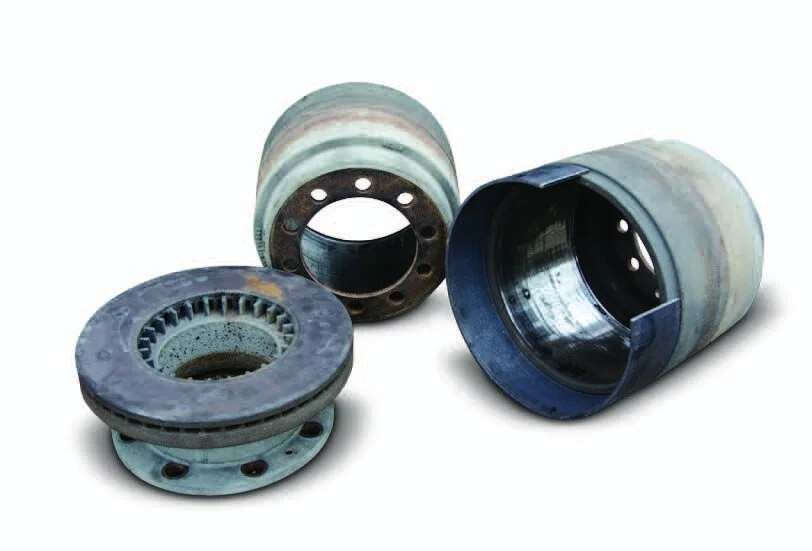 The parts: two brake drums and a disc brake with a rolled mild steel collar