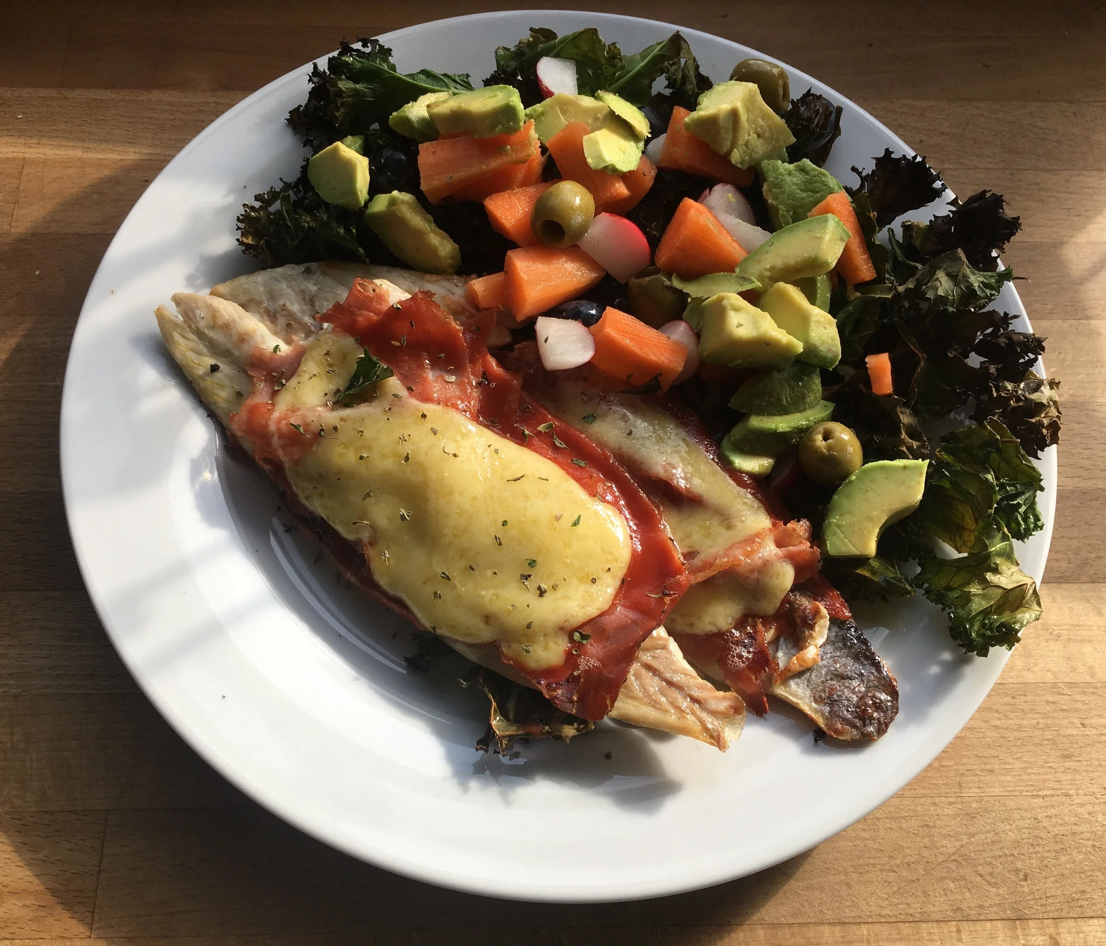 Grilled Sea Bass with Parma Ham and Cheese
