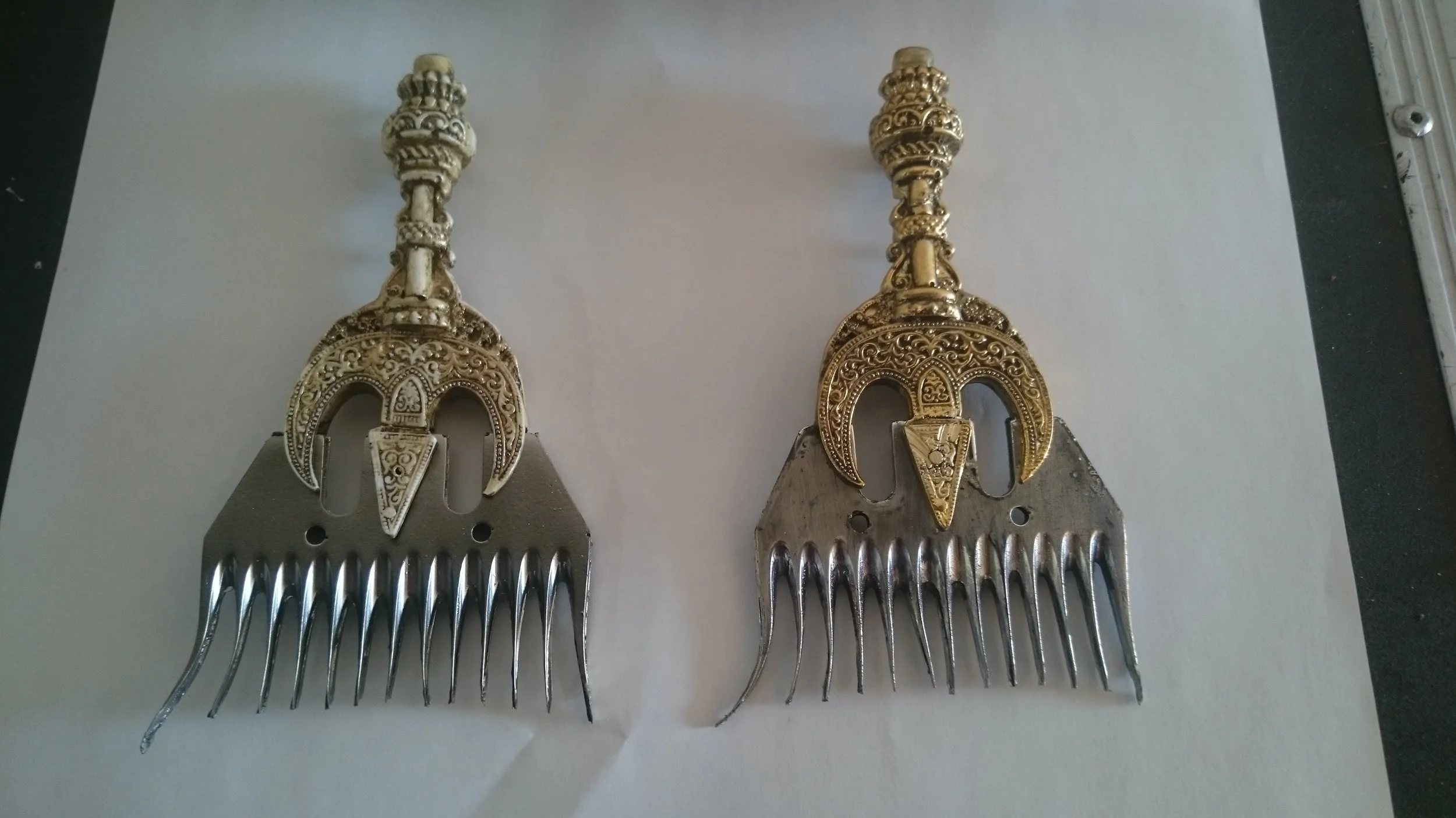  Baron Chau’s comb daggers, I designed, molded and painted these, they were cast in various materials from durable rubbers to extremely soft versions for fighting with. the image shows the screen used ivory dagger style on the left and the right dagg