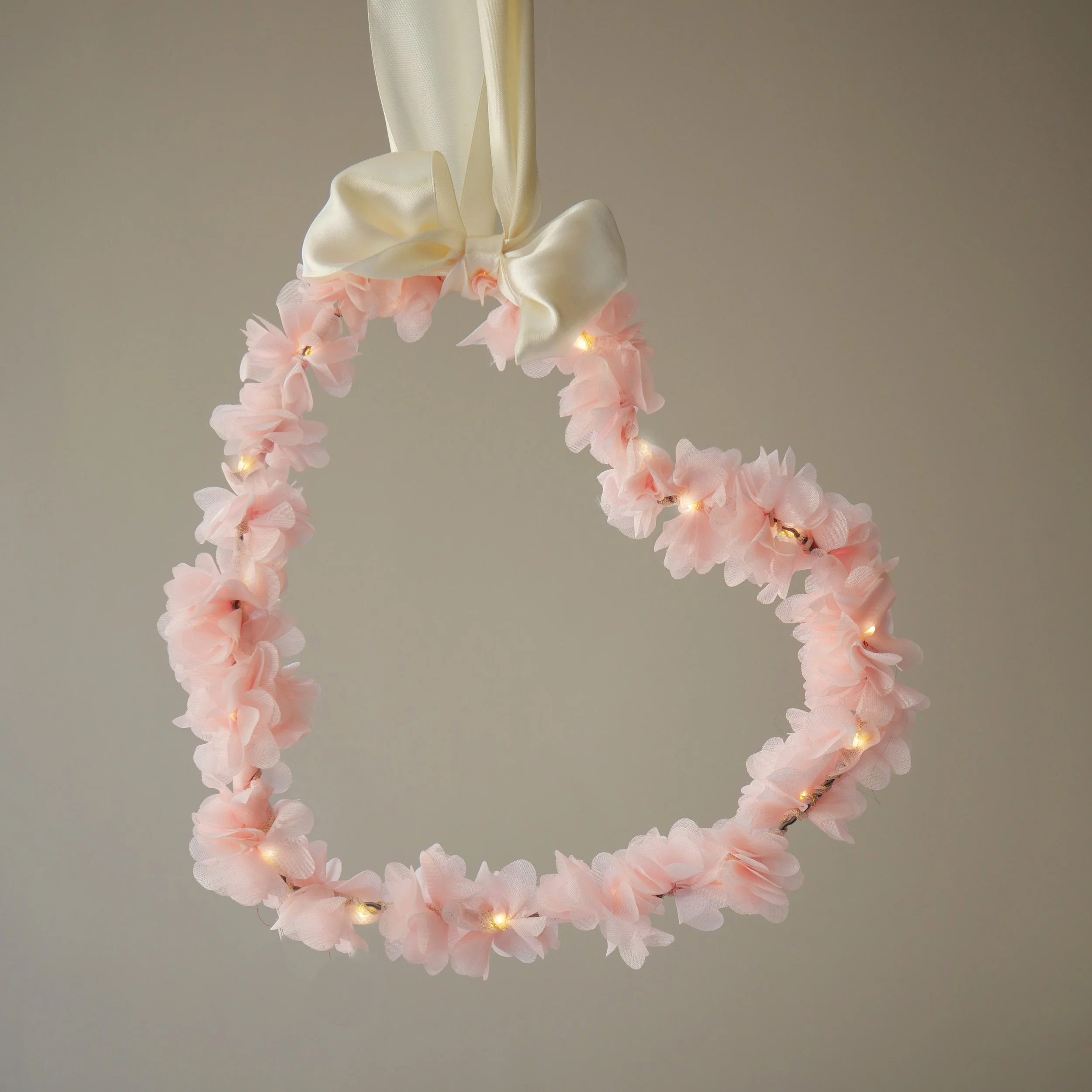Pastel pink chiffon flower heart light with satin bow and warm white LEDs