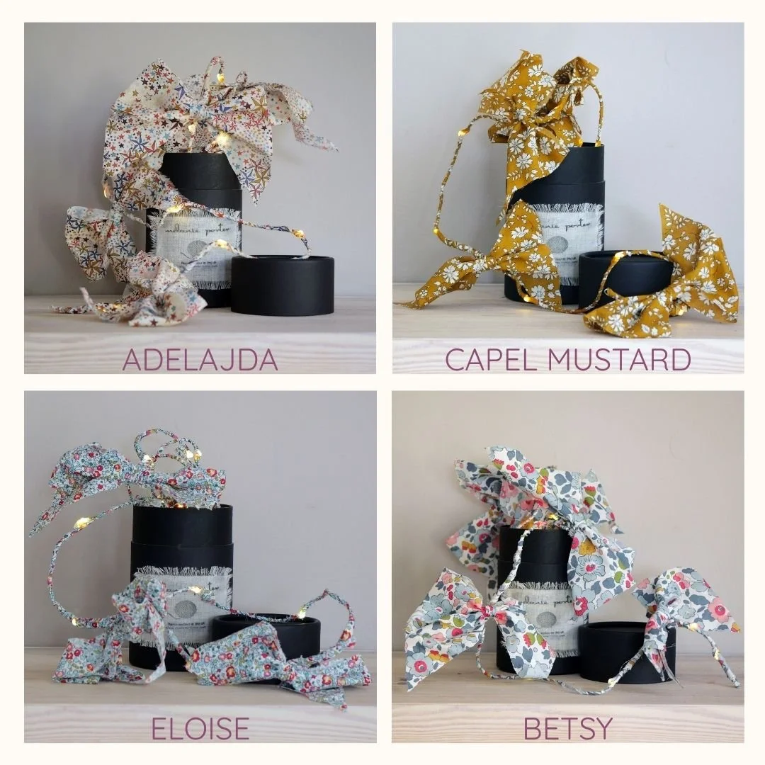 Liberty print bow fairy lights in Adelajda, Capel Mustard, Eloise and Betsy fabrics