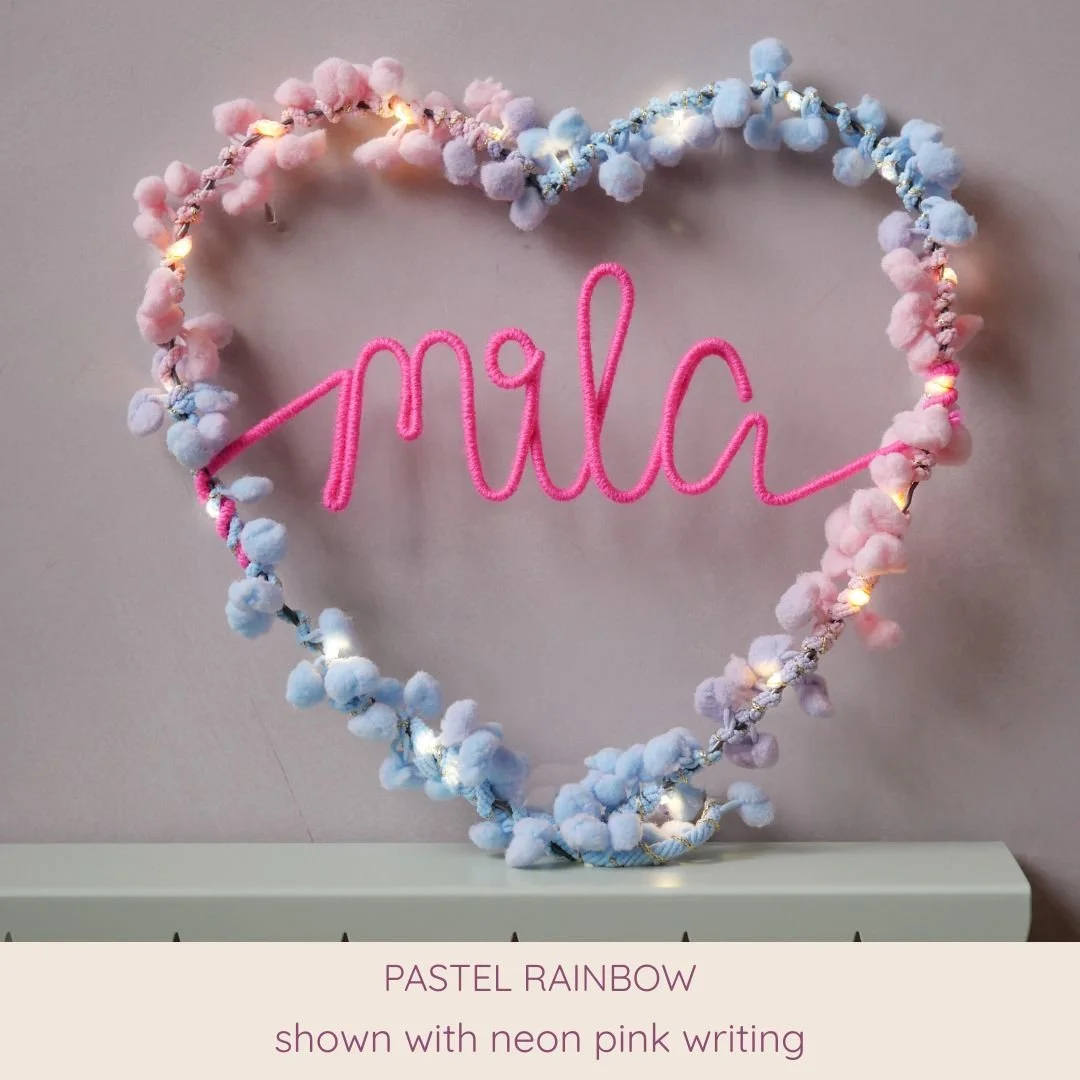 Pastel rainbow personalised heart light with Mila name in neon pink