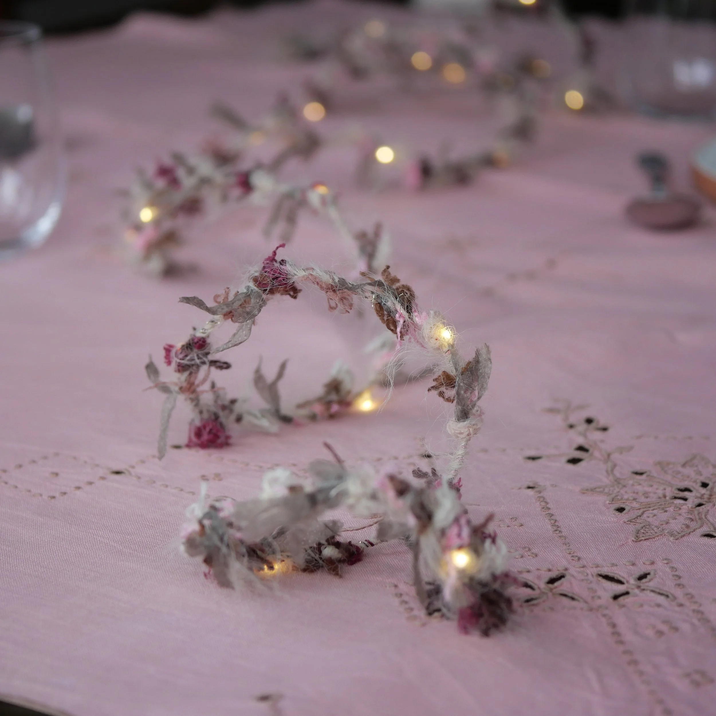 Close-up detail of hand-spun Hedgerow Fairy Lights showing textured art yarn and metallic fibre