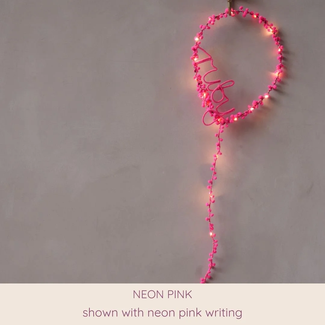 Neon pink personalised balloon light with neon pink name