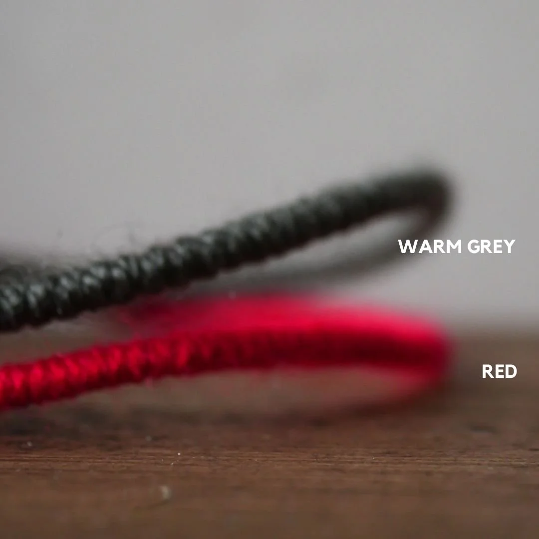 Warm grey and red lettering colour options