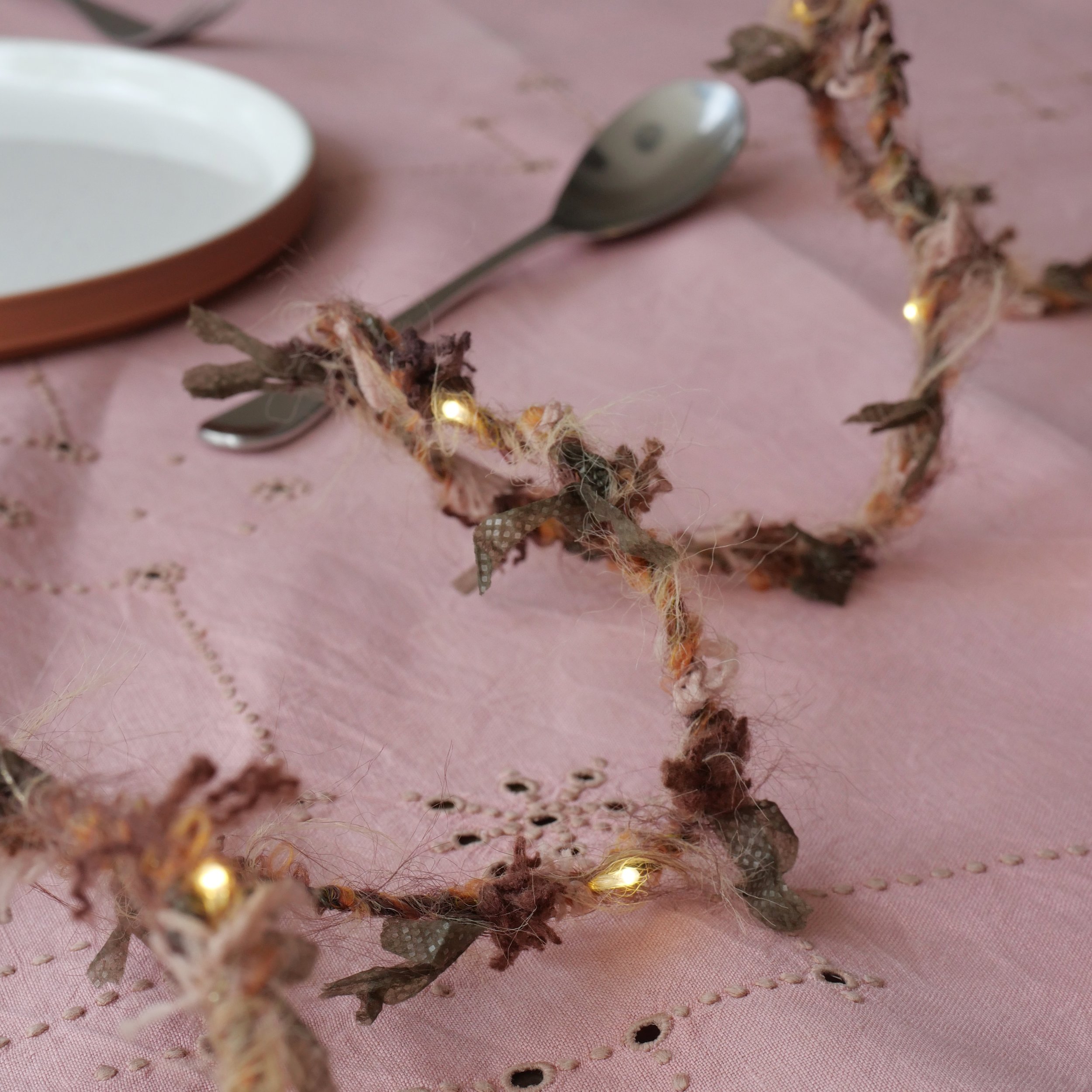 Autumn Hedgerow Fairy Lights with warm rust and earthy toned textured yarn
