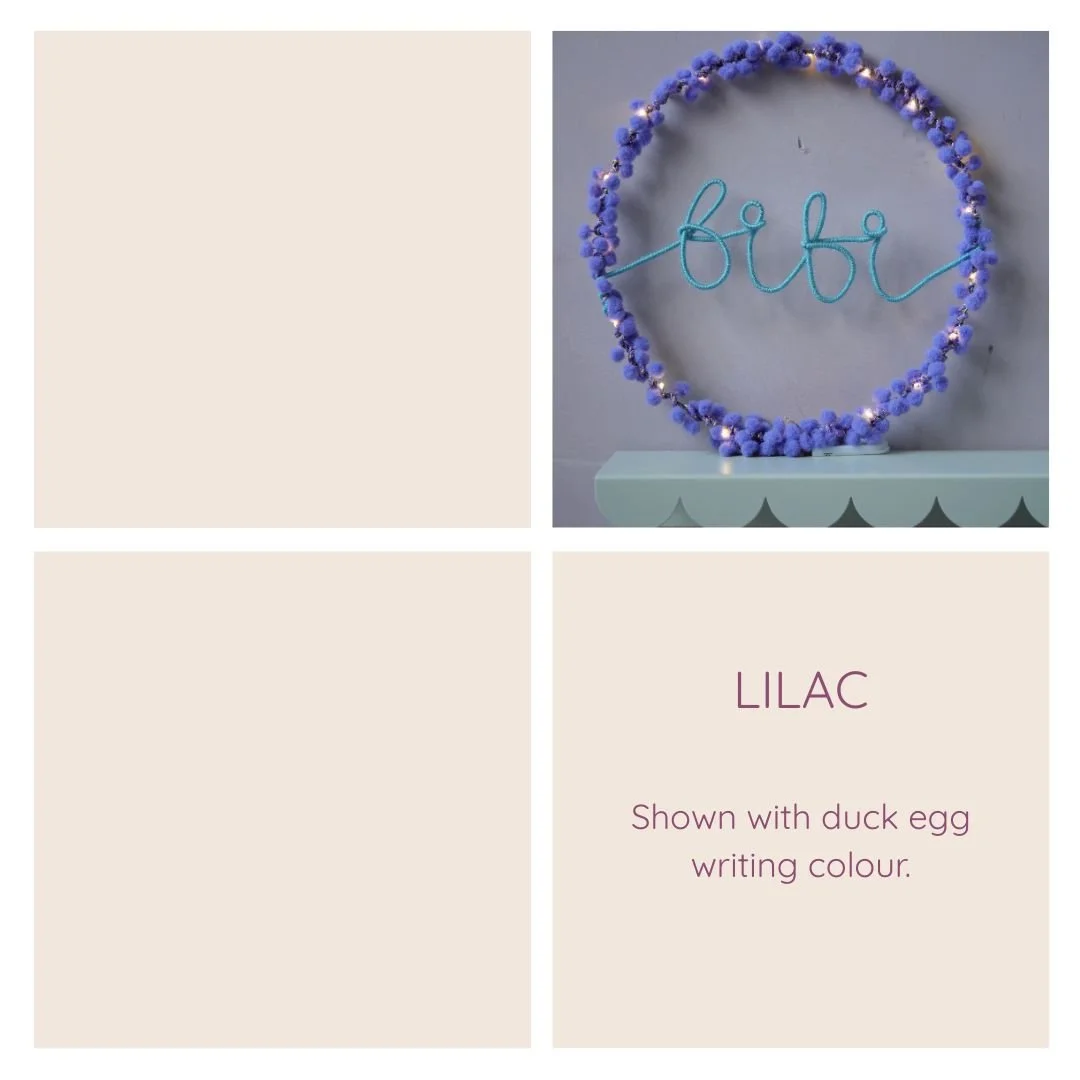Soft white personalised hoop light examples with different writing colours