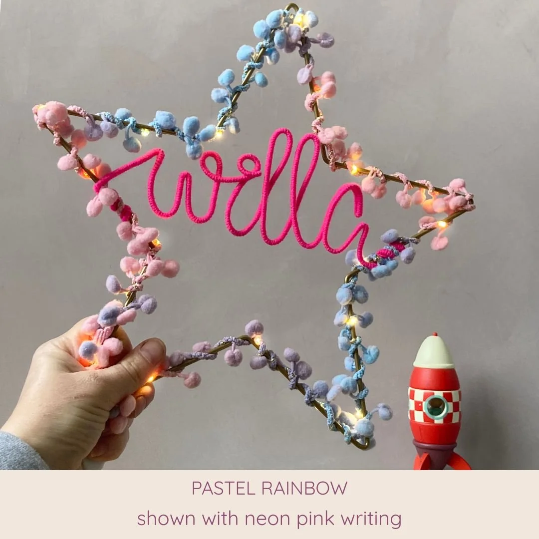Pastel rainbow personalised star light with Willa name in neon pink