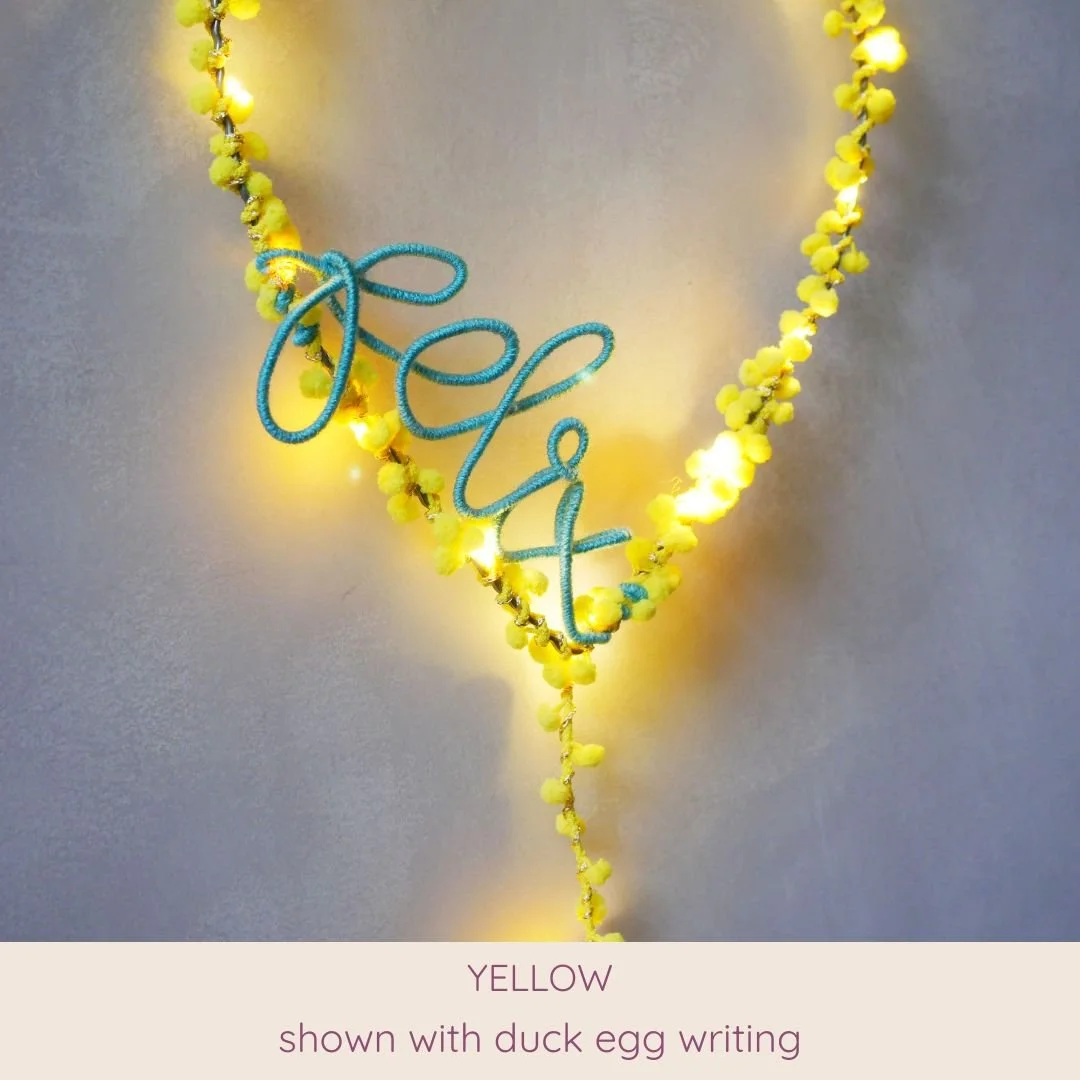 Yellow personalised balloon light with duck egg name