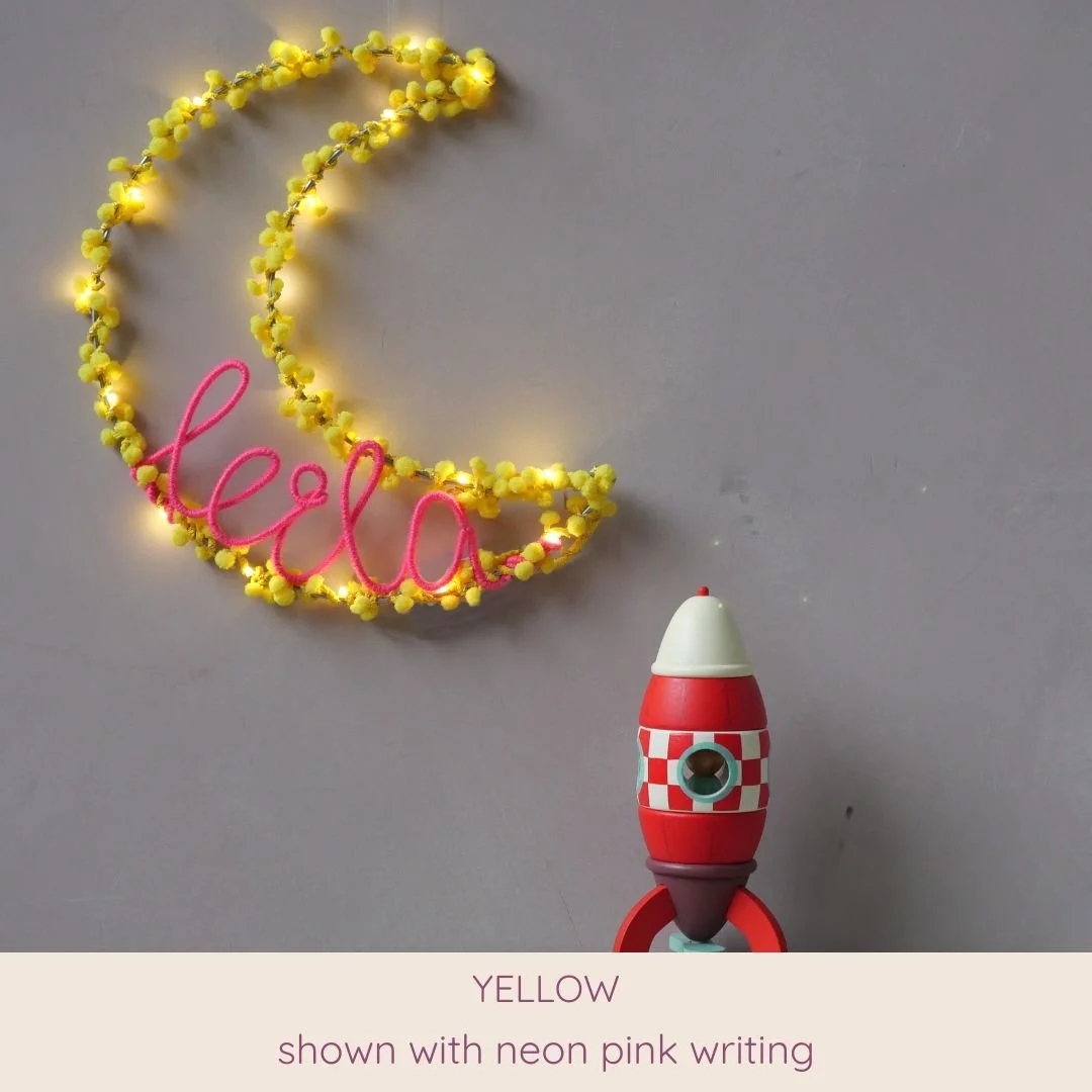 Yellow personalised moon light with custom name in neon pink