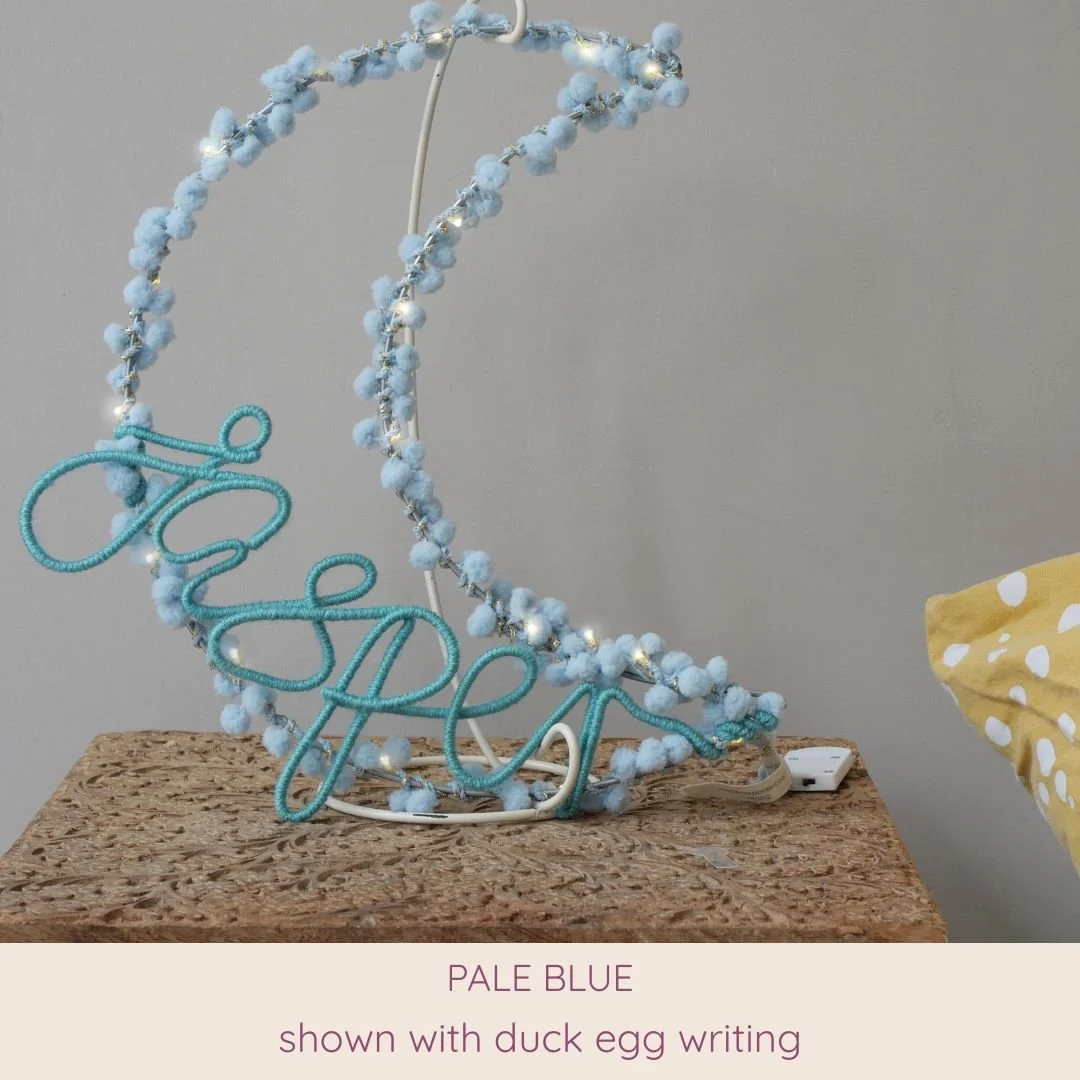 Pale blue personalised moon light with Freya name in duck egg