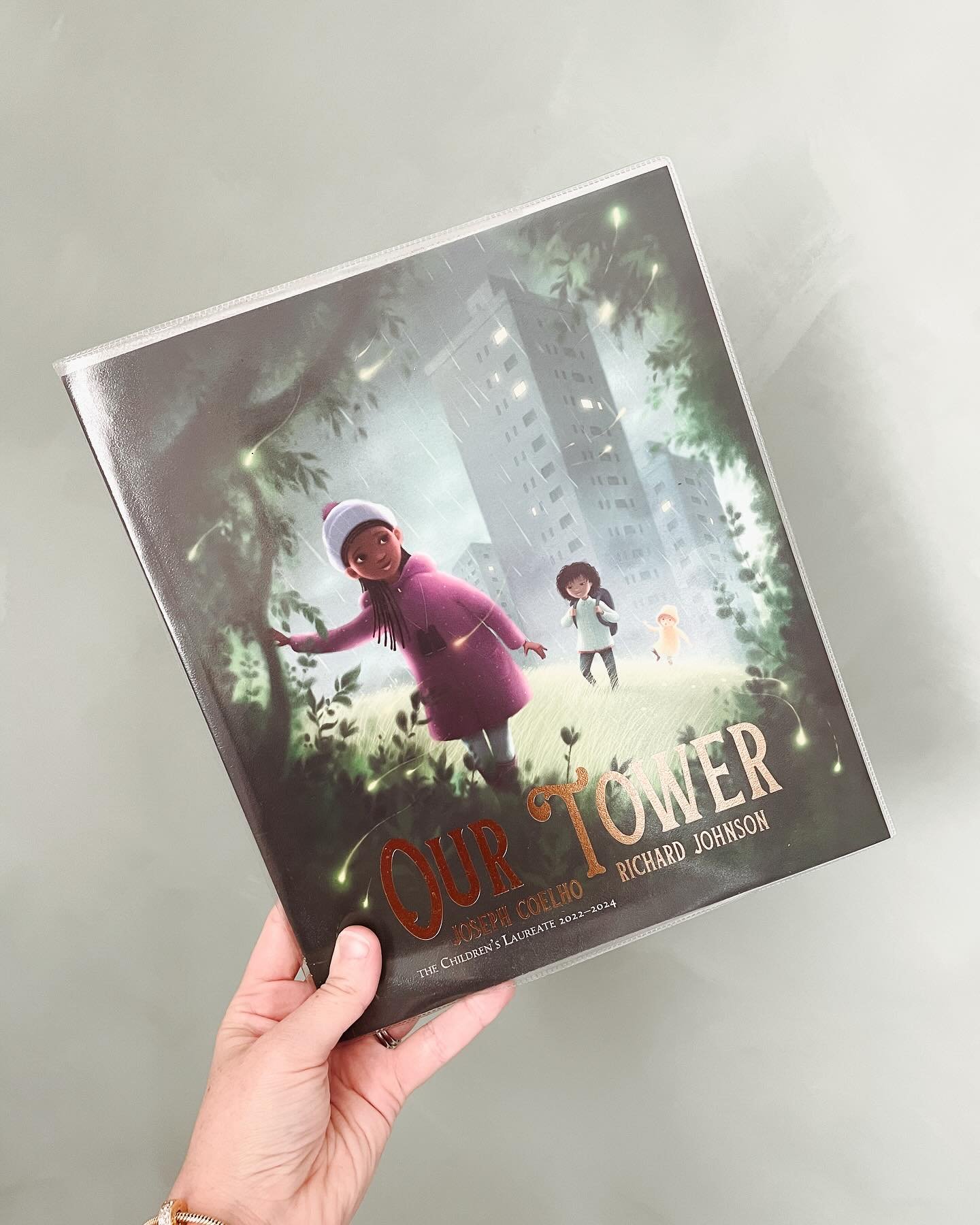 This book is beautiful. I adore the illustrations. Three children go exploring and discover a man in a tree who teaches them the magic they&rsquo;re looking for is in the building they live in. It&rsquo;s in the community and connections they share.
