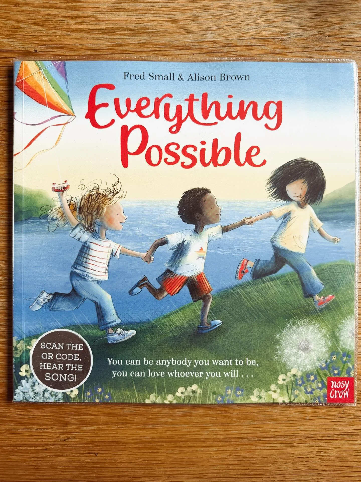 Everything possible is based on the song by Fred Small by the same name. The book features the lyrics as the text. It teaches children that they can choose their own path, follow their hearts and the important legacy is how they love others. The illu