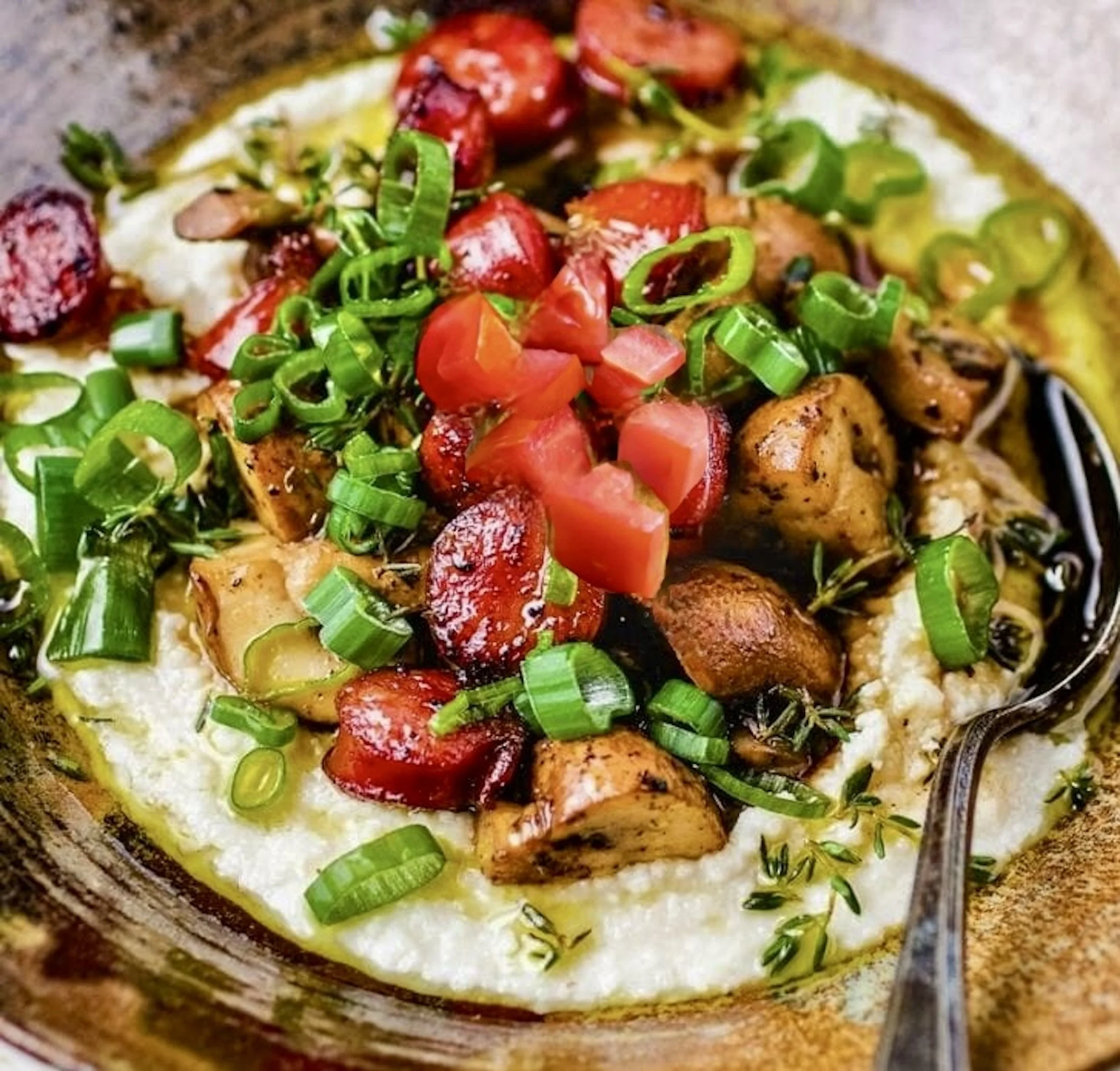 GRITS W/HAND-CRAFTED SAUSAGE, TOMATOES AND MUSHROOMS (GF, VEG)