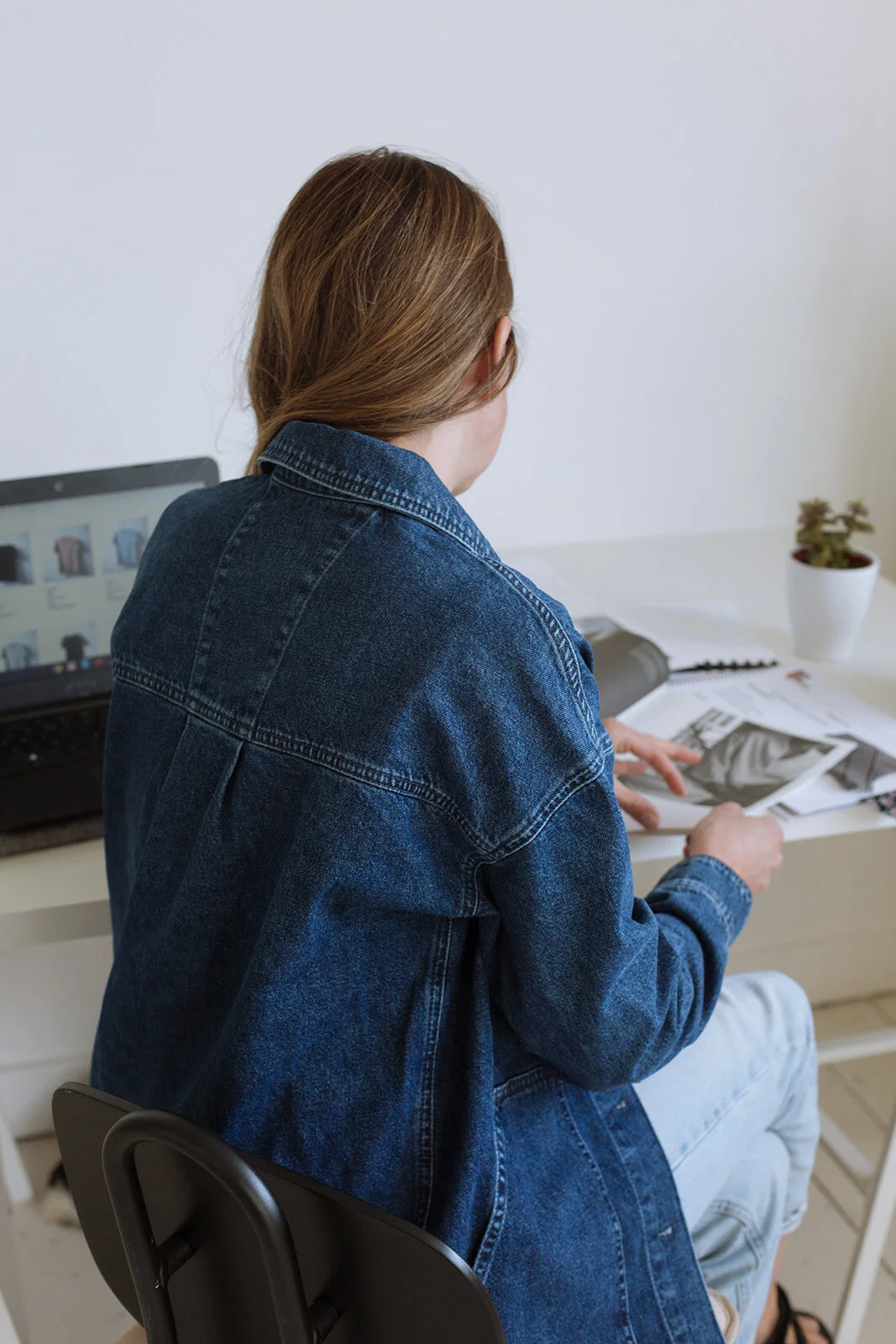 Nicole Davidson Fashion Buyer working in office.jpg