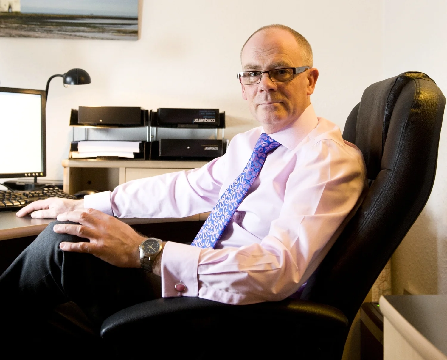 Mark Underwood seated at his desk