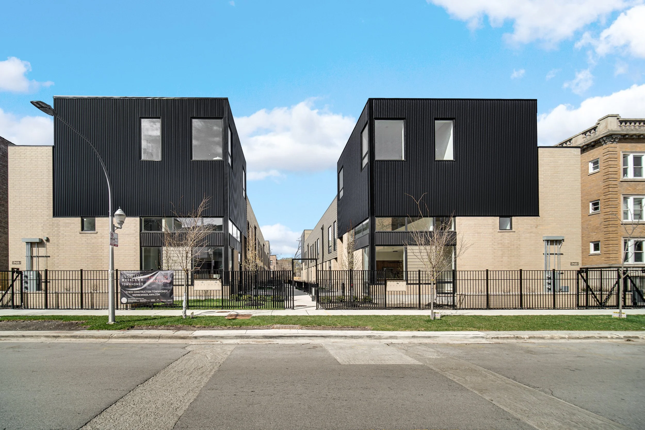 DevelopmentWideView _ Add Leaves to trees and clean up grass areas, remove banner on fence.jpg