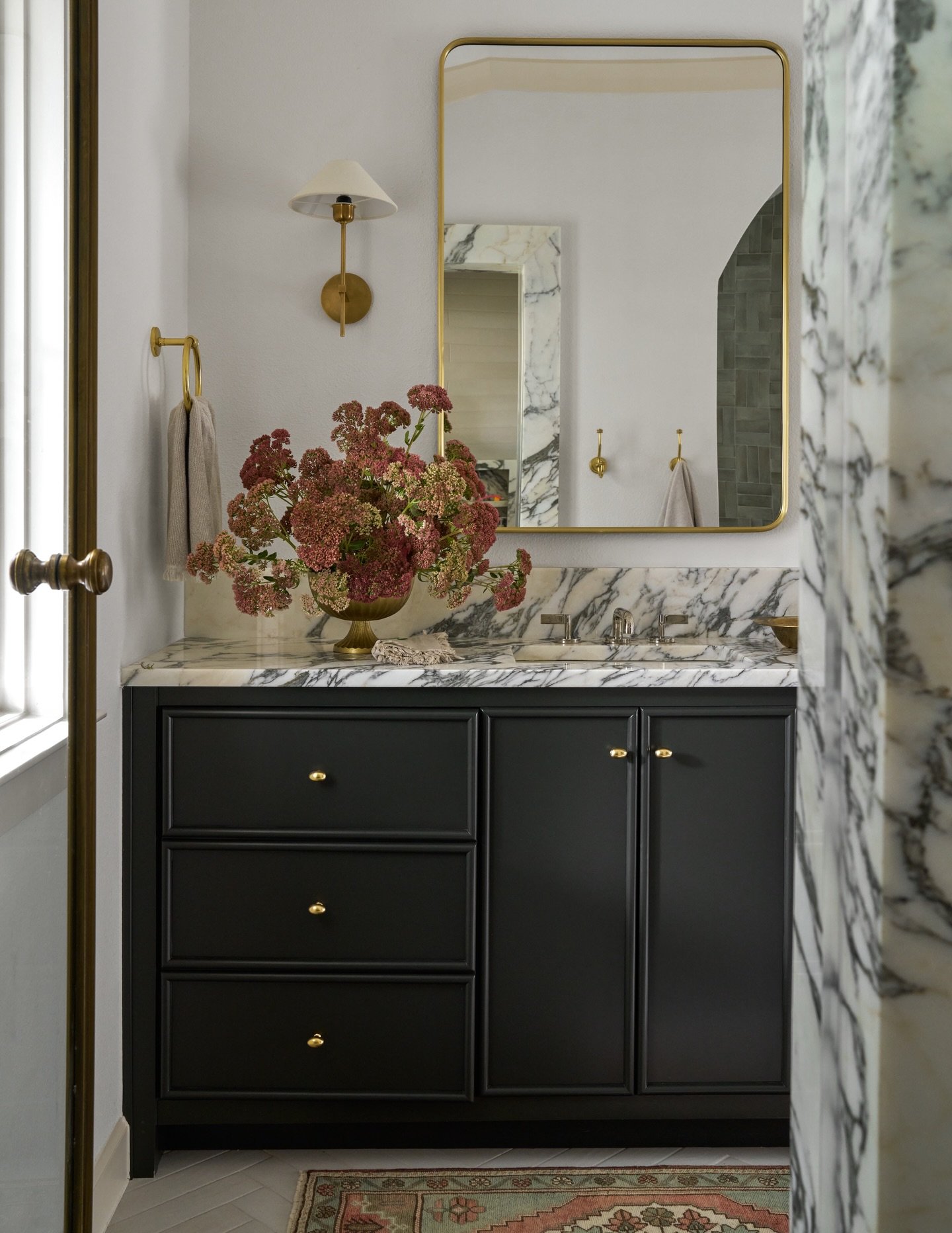 We can&rsquo;t believe we haven&rsquo;t shared more of this bathroom yet. It is part of a primary addition to a charming 1500 square-foot Lakewood home. We like to think it changed their lives. Or at the very least, their mornings.

Check our stories
