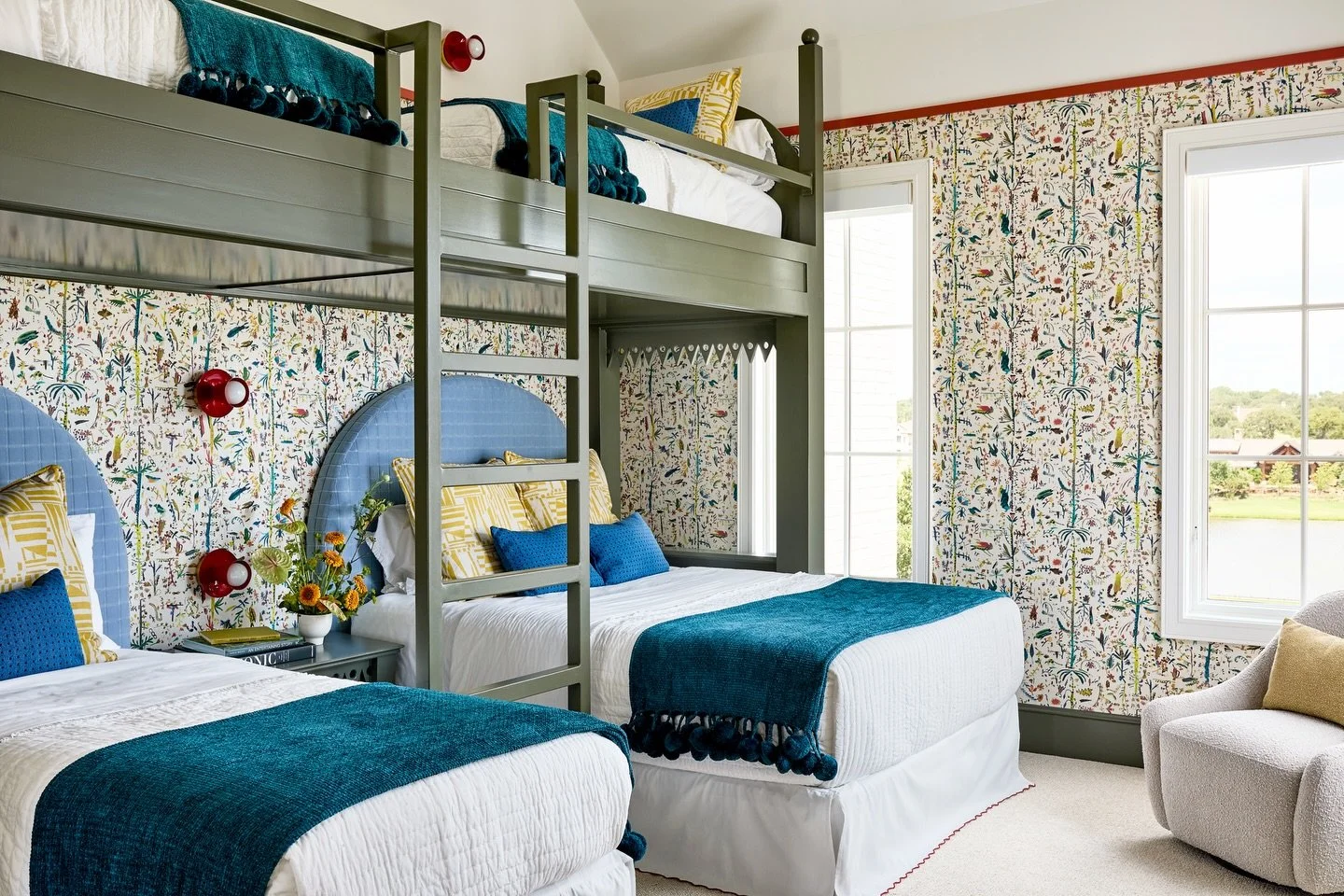 When we designed this bunkroom, the goal was simple: make it FUN. It&rsquo;s part of the kids&rsquo; wing and sits off the playroom and homework nook (plus a secret room with a loft and a slide obviously). The attached bathroom has a rainbow striped 