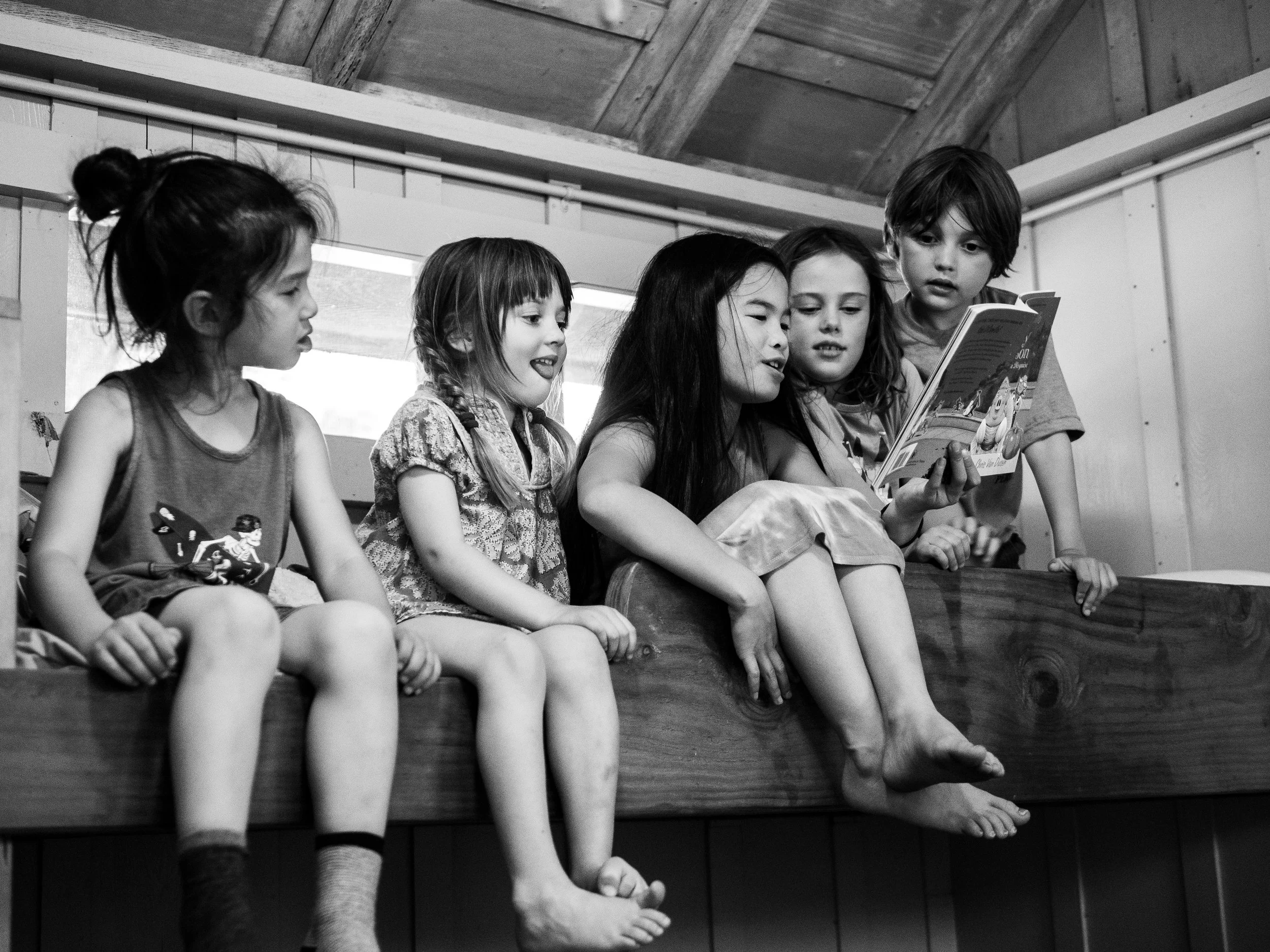 Paisley, reading to the littles for siesta time. 