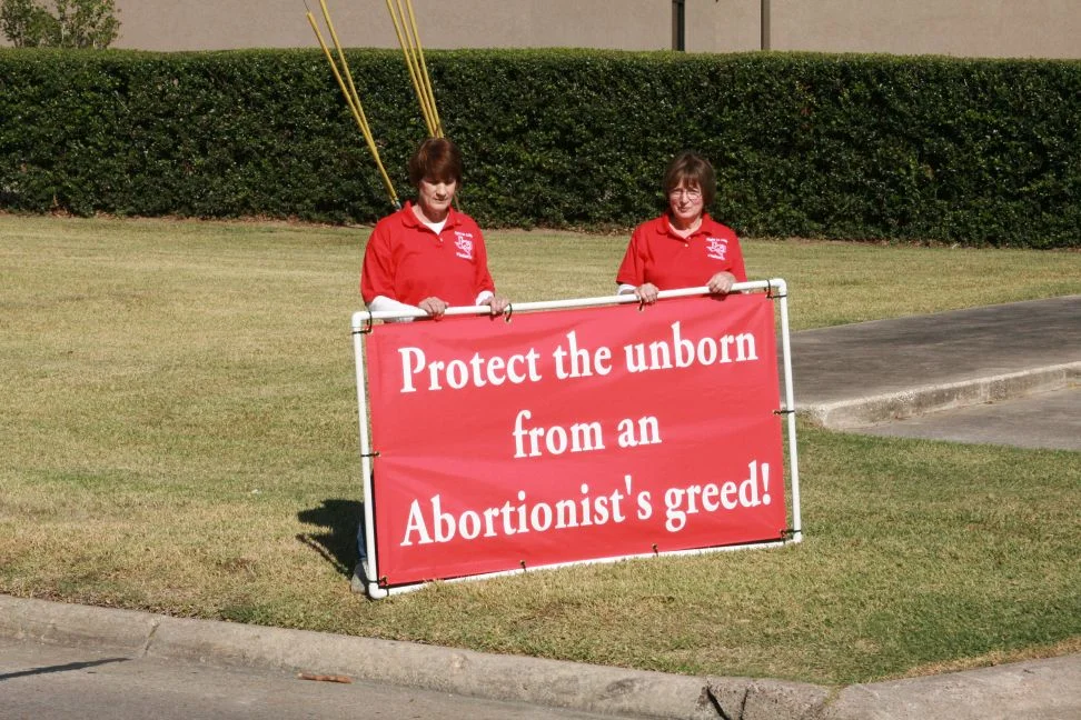 Two Ladies Standing Up for Life