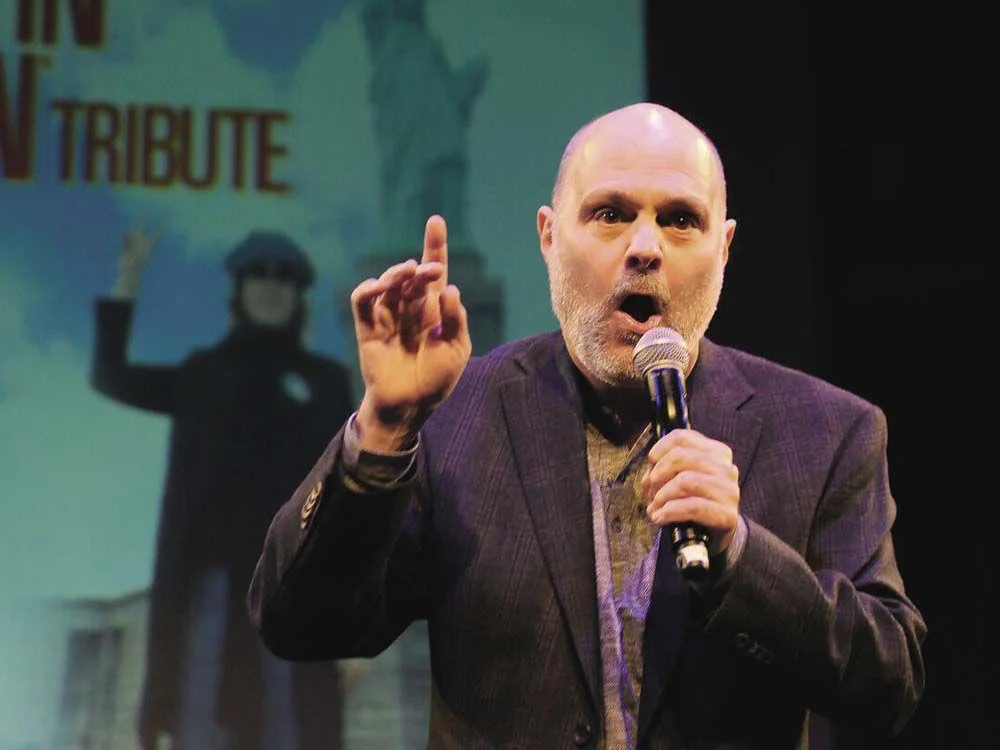 Satirist Joe Raiola intends to be provocative and is not shy about using words that make many people cringe. He says humor that makes people comfortable is just “a massage.” Photo: Mike Thut