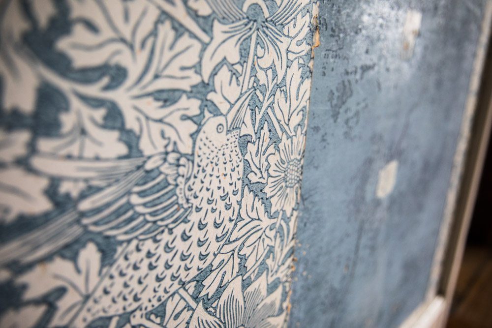 Children's bedroom wallpaper and revealed paint