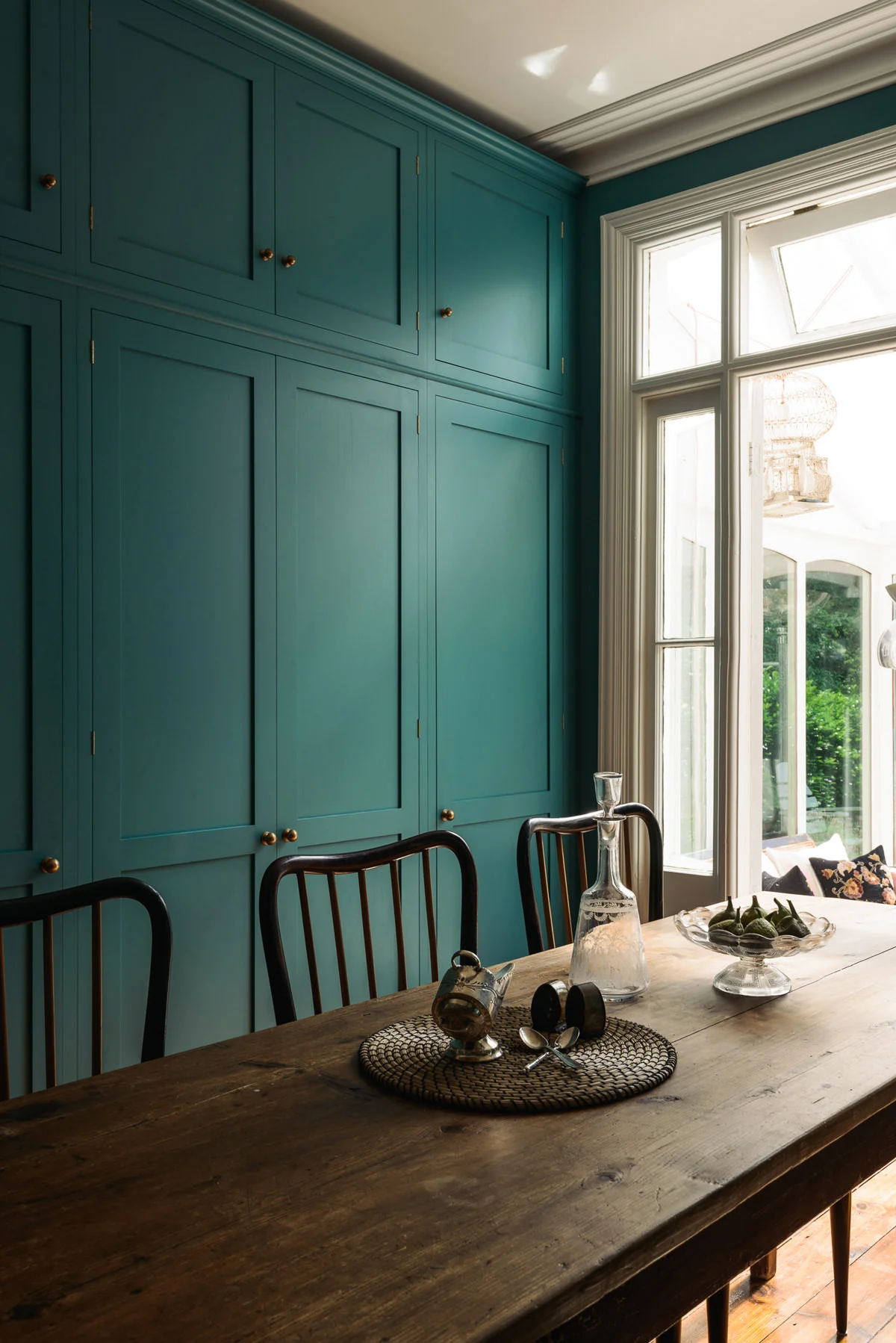 I love how the colour here (it must be Vardo by Farrow and Ball?) adds a little playfulness but how the space still retains an elegant feel. Image credit: DeVOL Kitchens