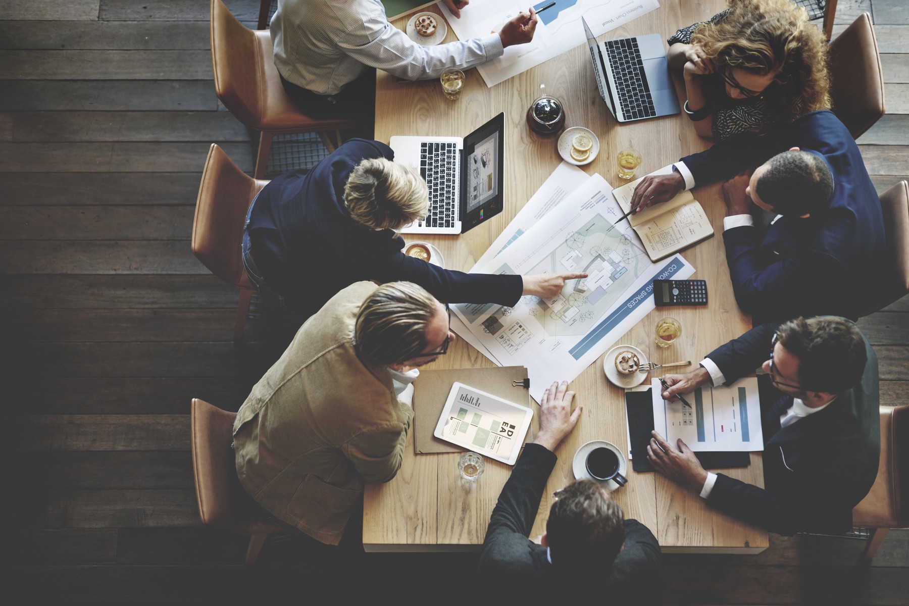 Busy professionals on a table.jpg