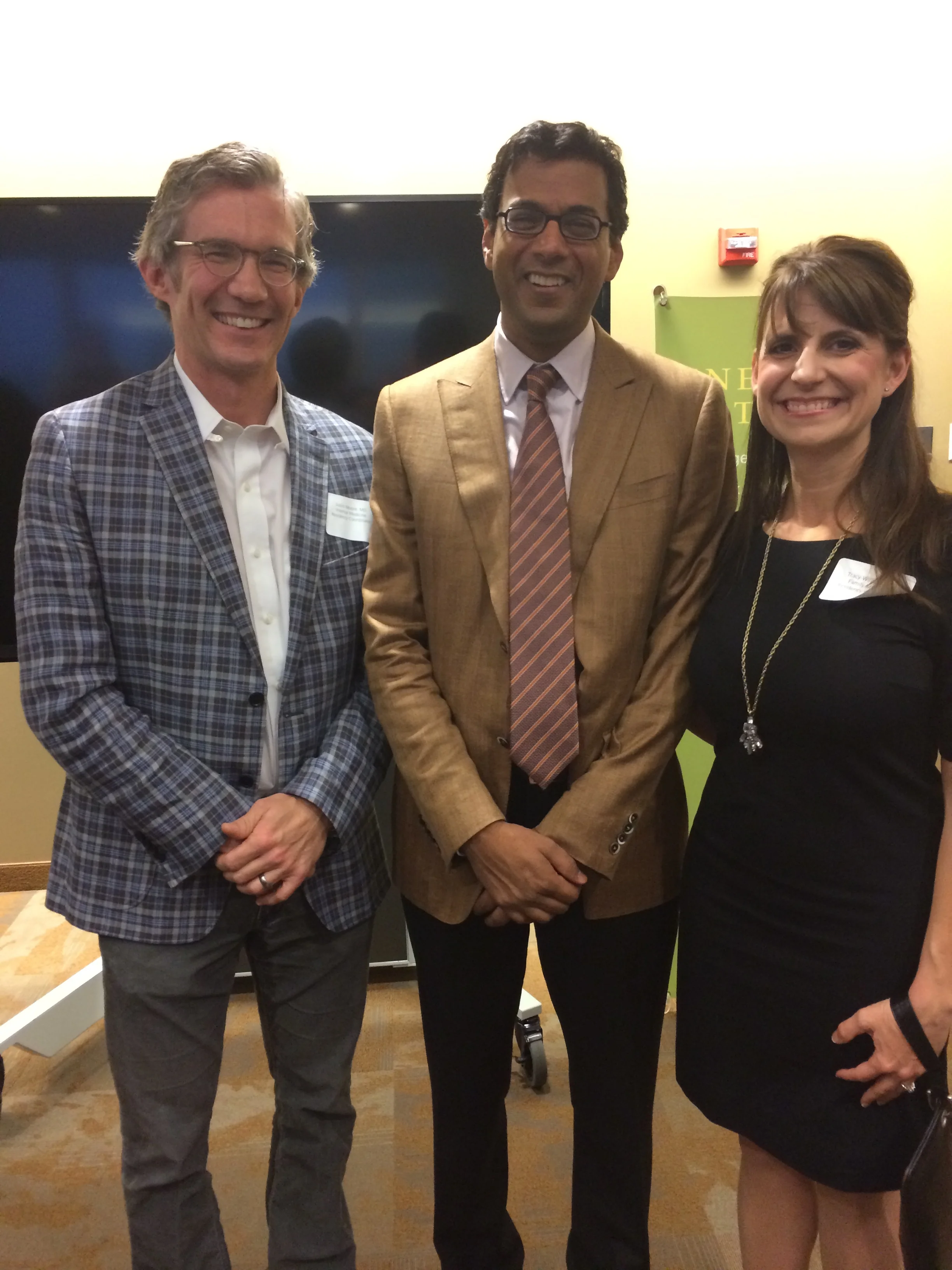 Atul likes the right hand over the left. I'm a left-over-right guy. Dr. Williams prefers to have her hand on Atul himself. 