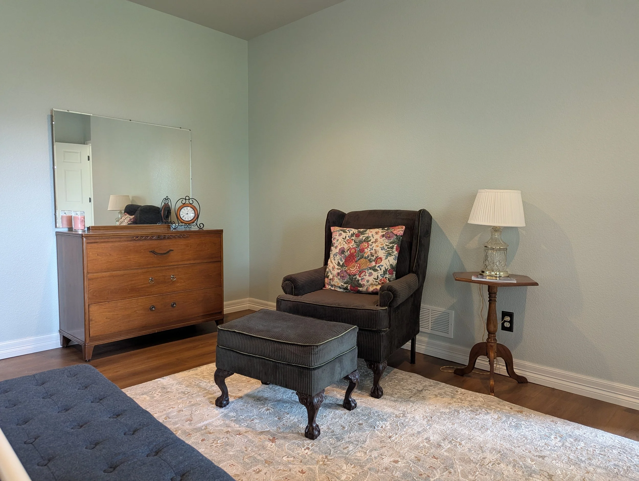 A reupholstered pewter grey corduroy velvet chair and ottoman with the coolest feet -- a Jamie Grandy Designs custom!