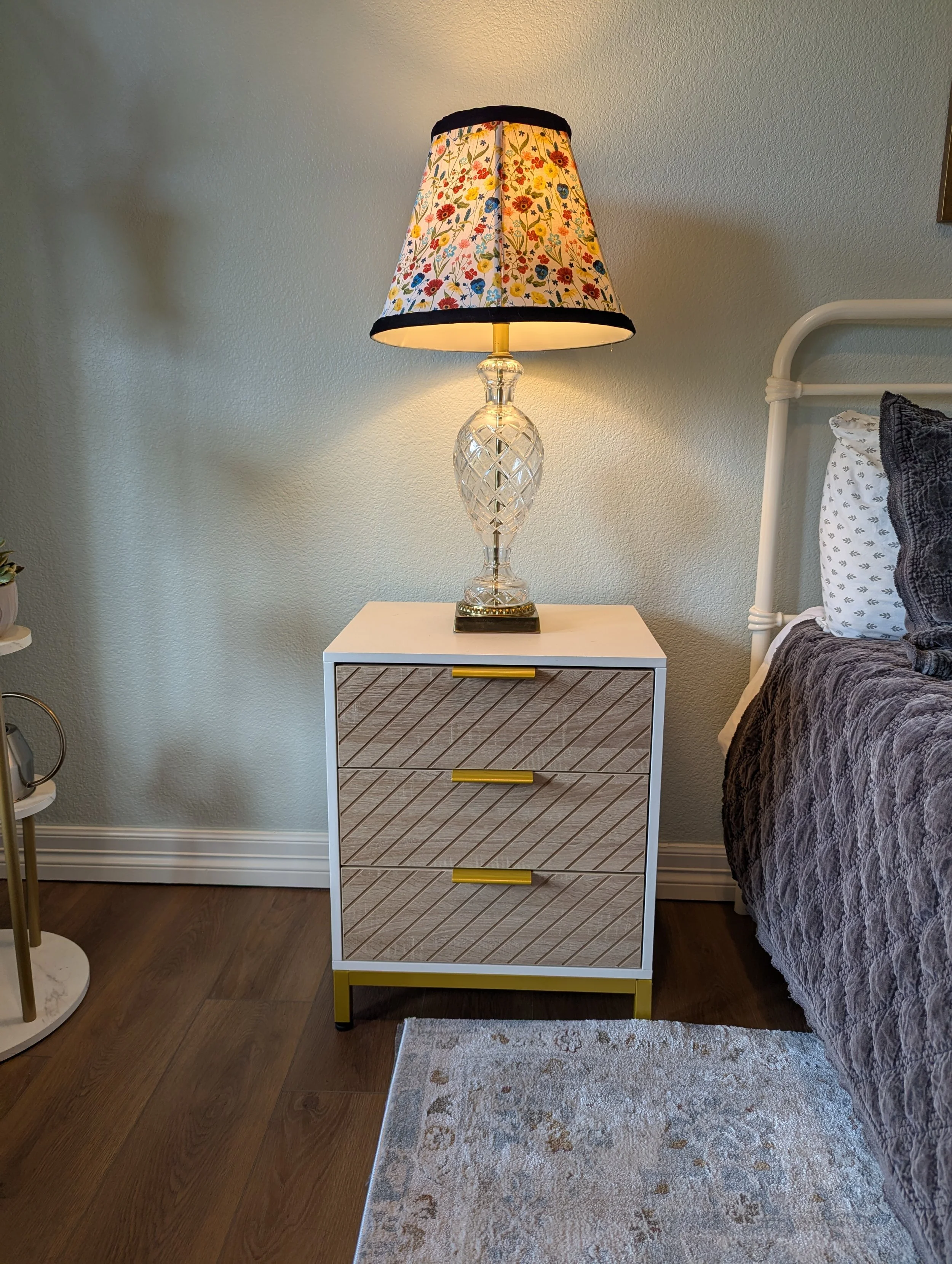 Jen found these amazing German crystal lamps at an estate sale. I made custom shades once we picked the dizzying array of florals on the cushions.