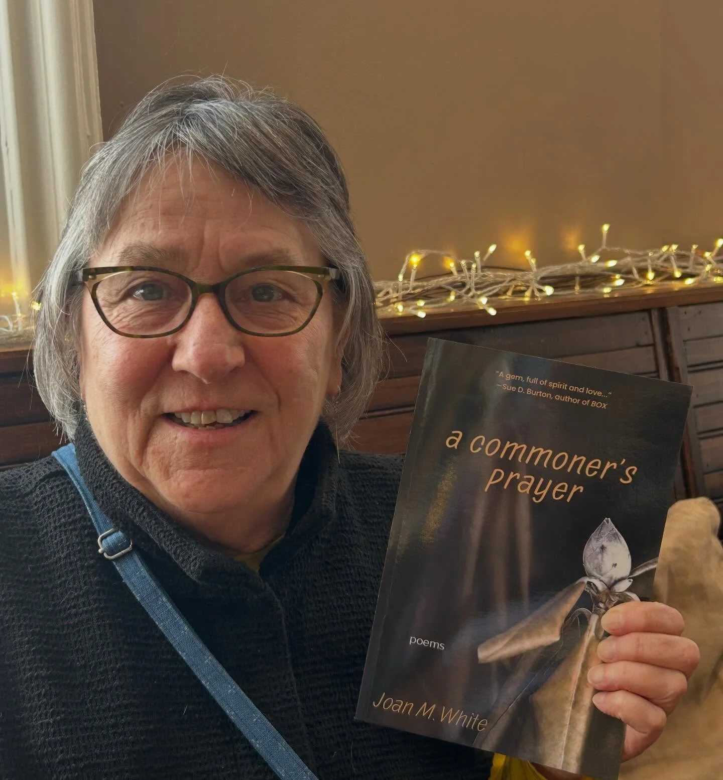 Another happy Rootstock author! Poet and Zen Buddhist Joan M. White @aggiemyth of Shelburne, Vermont holds an early copy of her debut poetry collection &ldquo;a commoner&rsquo;s prayer&rdquo; (cover photograph by @e.cross.photo) which officially rele