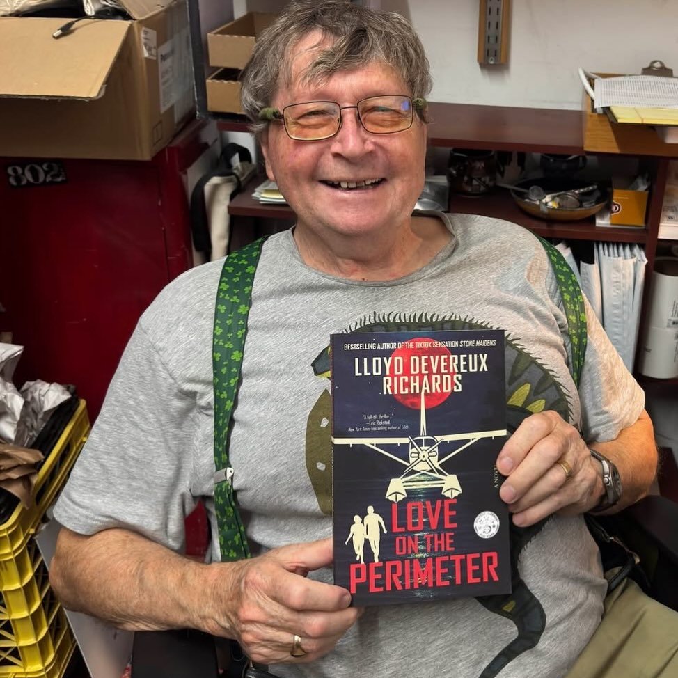 We love to see a happy author with their book at their local bookstore! Here&rsquo;s Lloyd Devereux Richards @lloydrichards.author with a copy of his brand new thriller LOVE ON THE PERIMETER in the back office of @bearpondbooks, where he signed preor