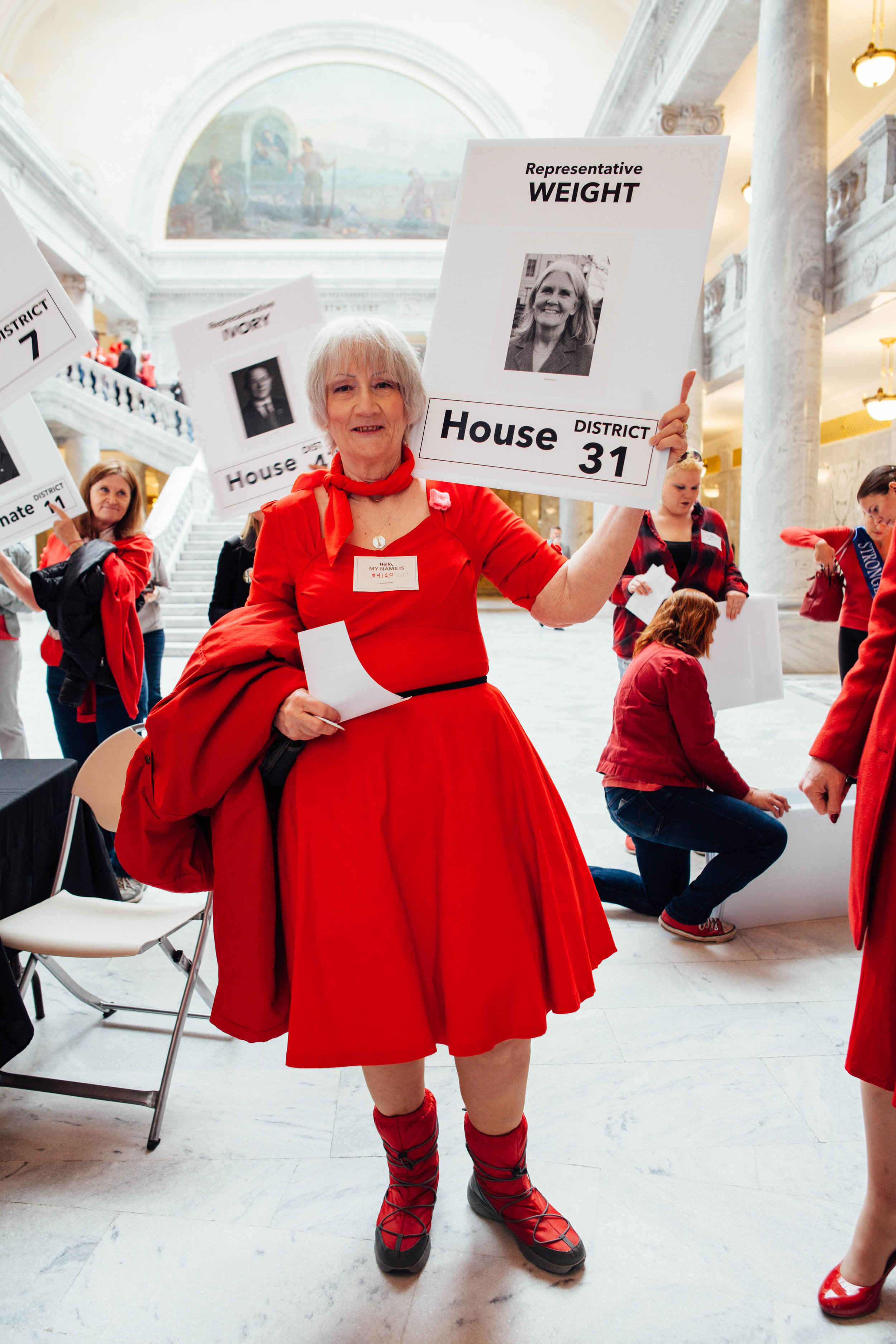 Judy Larson of West Valley City waits tentatively to speak to her representative. 