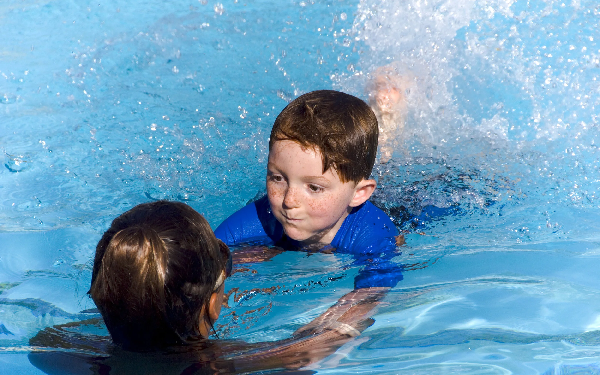 3991743-Child-Swimming-Stock-Photo.jpg