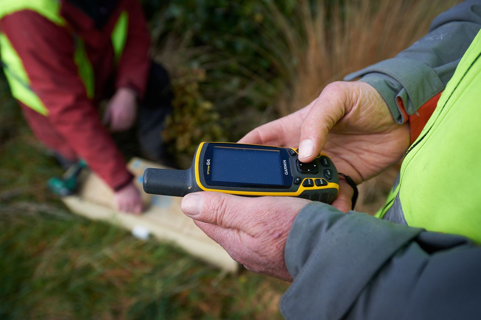 Matt and a volunteer GPS tracking traps