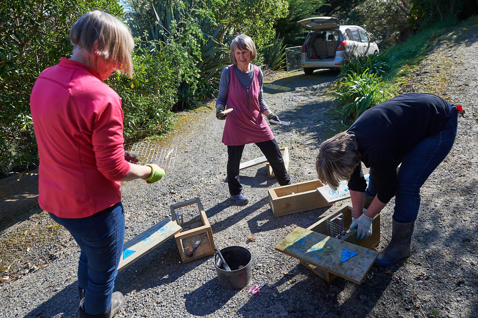 Volunteers cleaning traps