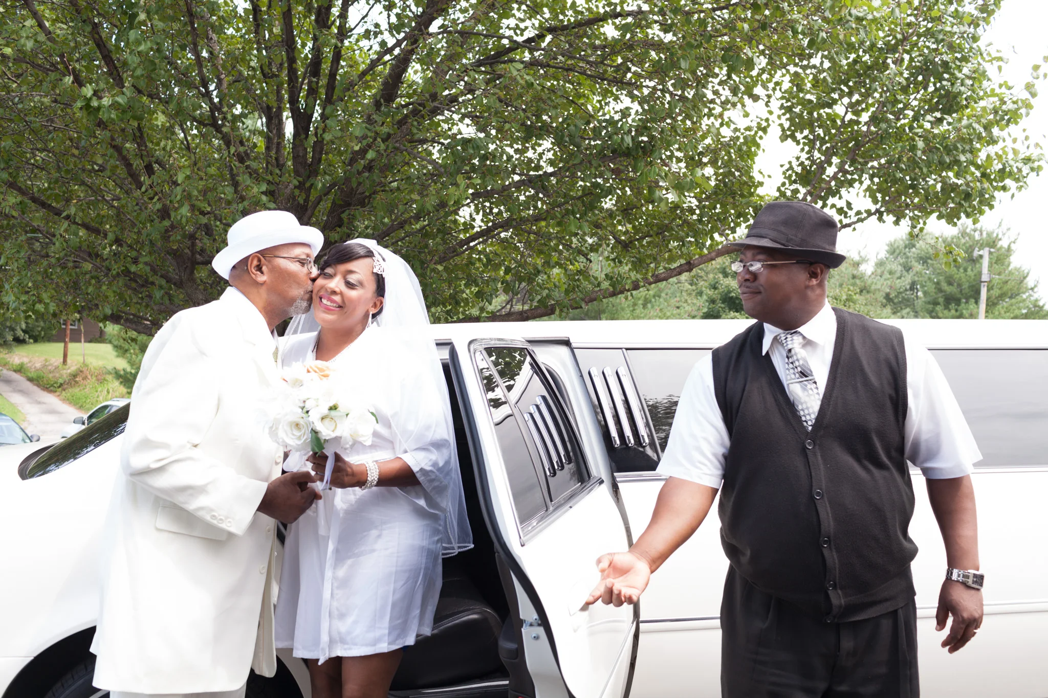 Crystal arriving in style. Her handsome father gives her a little kiss for good luck. 