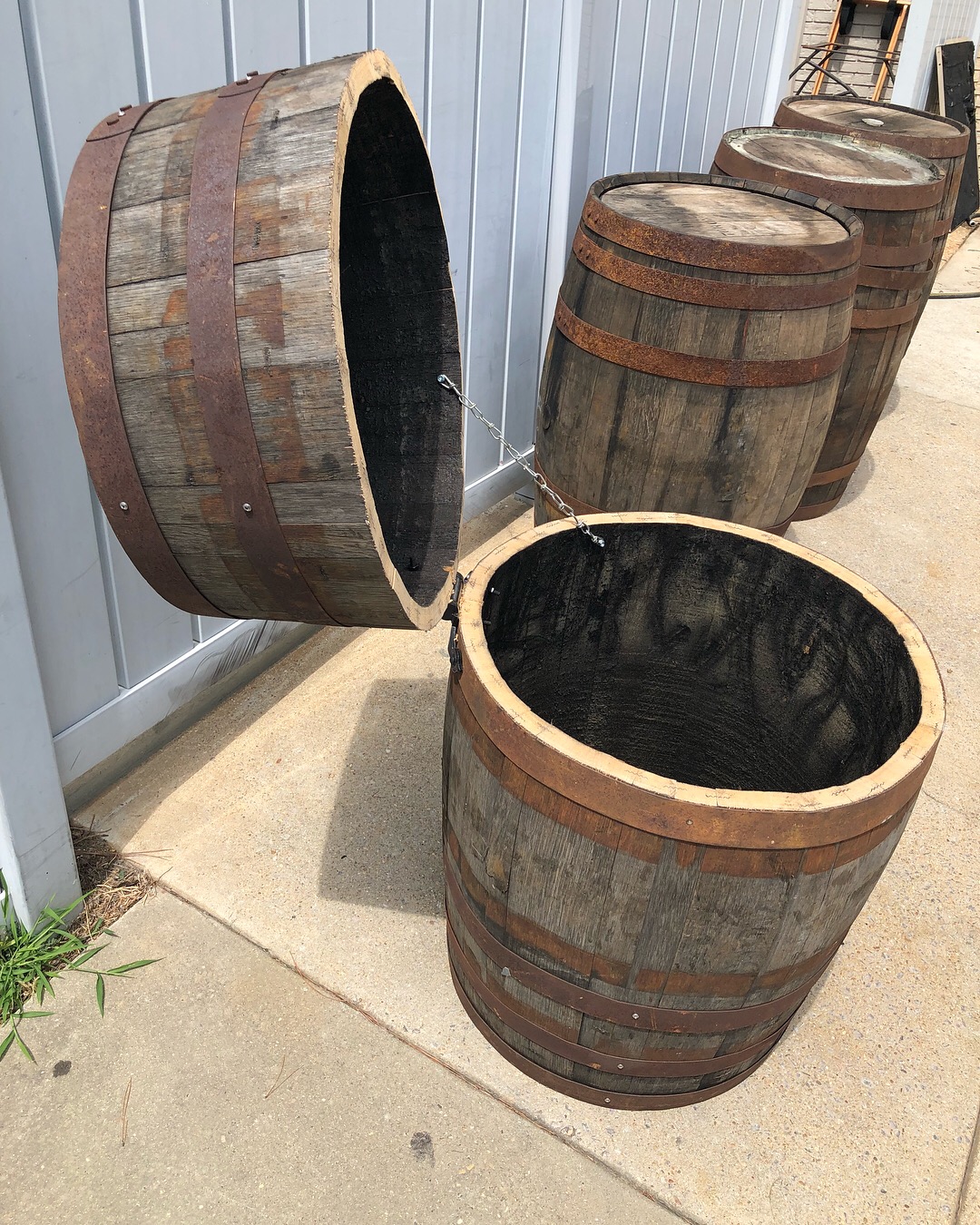 Whiskey barrel trash can.